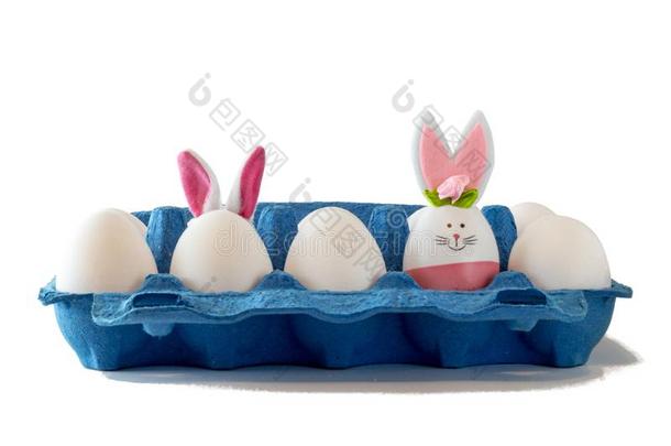 复活节地点和有色的卵,复活节兔子,,白色的背景