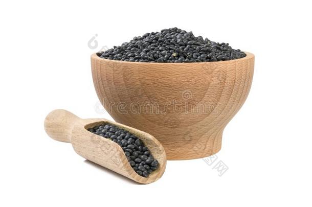 黑的小扁豆鲟采用木制的碗和铲隔离的向白色的