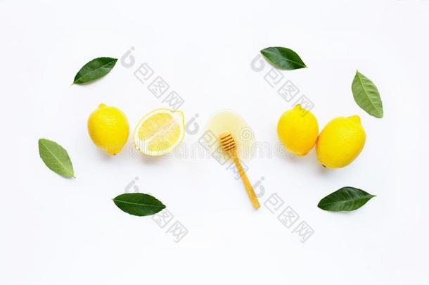新鲜的柠檬和蜂蜜向白色的
