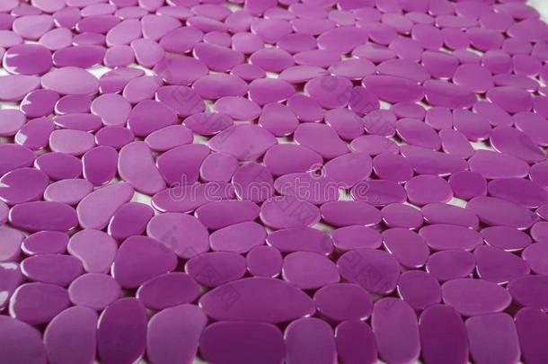 紫色的橡胶席子为沐浴和模式同样地背景,模仿