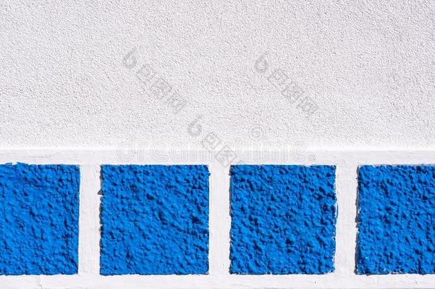 一蓝色白色的石头墙和模式