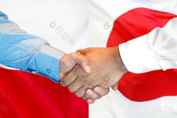 握手向波兰和黑色亮漆<strong>旗背景</strong>