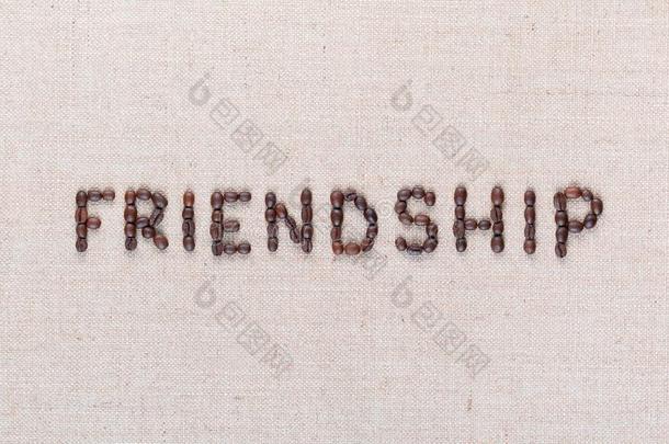 友情单词书面的和咖啡豆豆,对准的采用指已提到的人中心