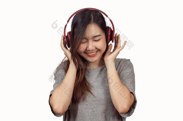 年幼的女人使人疲乏的戴在头上的耳机或听筒享有新的听觉的小<strong>路演</strong>奏采用