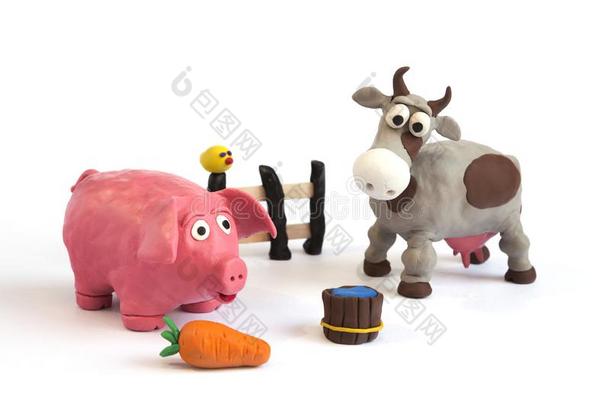 手工做的塑像用黏土黏<strong>土猪</strong>和奶牛农场