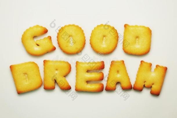 好的梦想单词从字母表饼干向白色的背景