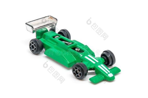 照片关于绿色的玩具模型汽车隔离的向白色的背景