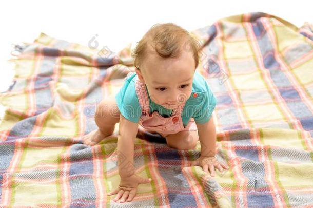 一好奇的小的num.一.漂亮的婴儿表面涂布不均向地面.微笑的小的