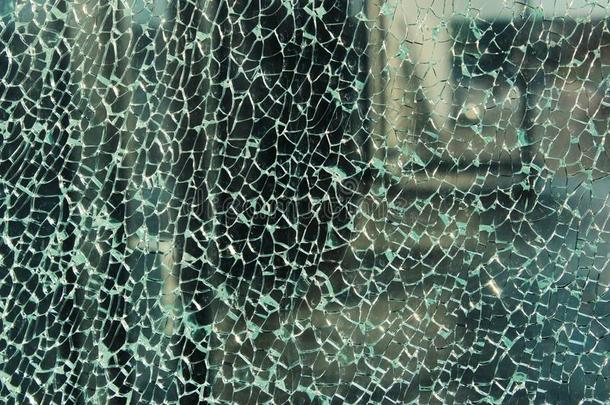 变模糊射手关于破碎的玻璃.破碎的窗背景.