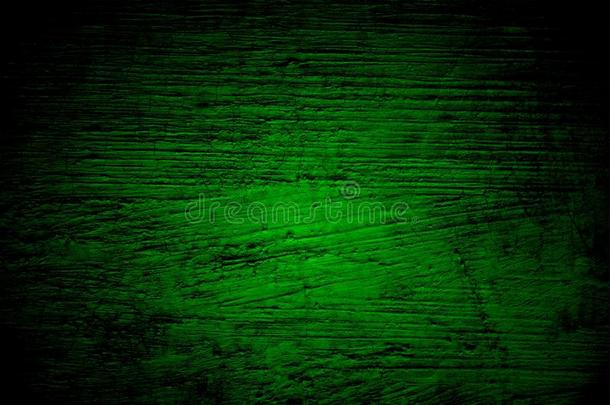 绿色的和黑的蹩脚货墙织地粗糙的背景.