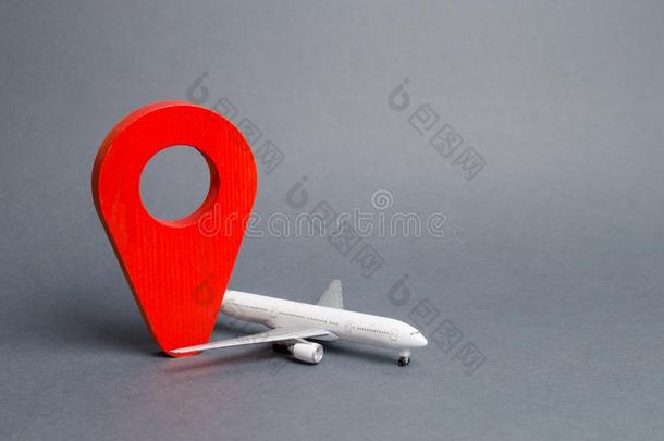 红色的位置钉和乘客客机.天空旅行和旅游,