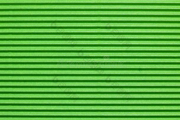 织地粗糙的富有色彩的绿色的波纹的卡纸板