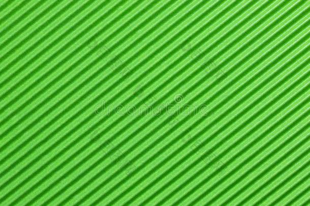 织地粗糙的富有色彩的绿色的波纹的卡纸板