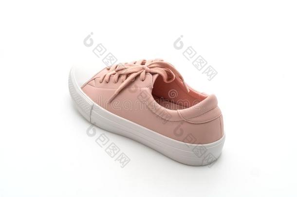 粉红色的旅游鞋鞋子向白色的背景