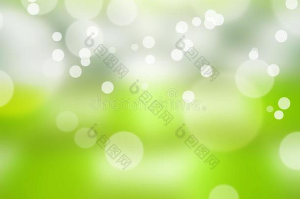 绿色的抽象的光焦外成像背景,圆形的光斑.
