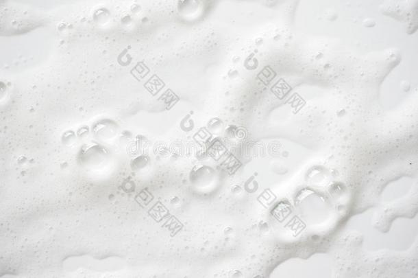抽象的背景白色的含有肥皂的<strong>起泡</strong>沫质地.洗发剂<strong>起泡</strong>沫和