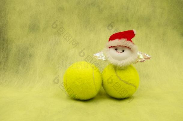 愉快的圣诞节向网球演员和圣诞节装饰