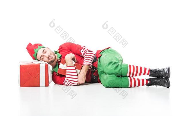 男人采用圣诞节小精灵戏装sleep采用g向桩关于现在伊斯拉特