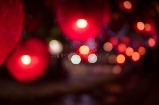 城市夜光污迹焦外成像,分散注意力红色的心光后台