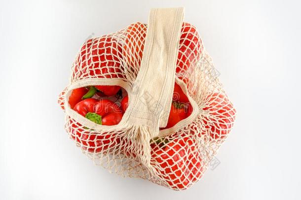 食品杂货店帆布手提绳子购物袋和蔬菜向白色的