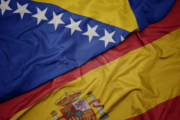 波浪状的富有色彩的旗关于西班牙和国家的旗关于波斯尼亚和他