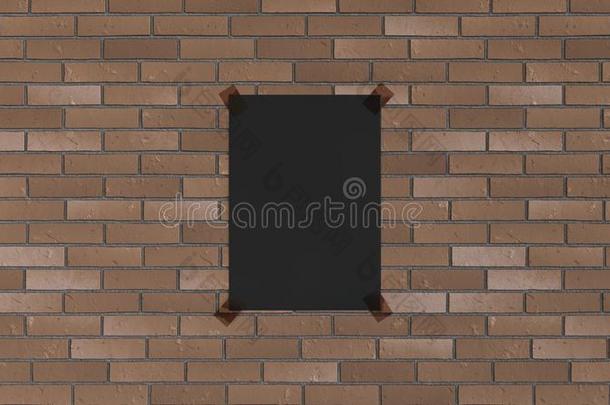 空白的黑的垂直的海报用带子捆起来向指已提到的人砖墙