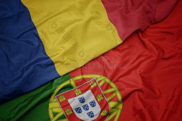 波浪状的富有色彩的旗关于葡萄牙和国家的旗关于罗马尼亚