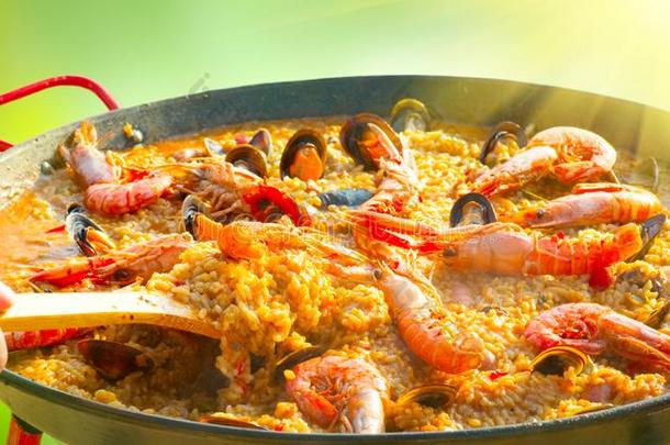 肉菜饭.传统的西班牙的食物,sea食物肉菜饭和贻贝,英语字母表的第11个字母