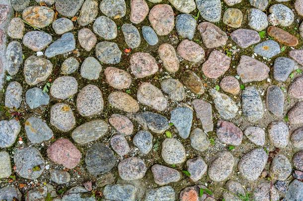石头背景关于人行道和粗糙的花岗岩卵石.梅迪耶夫