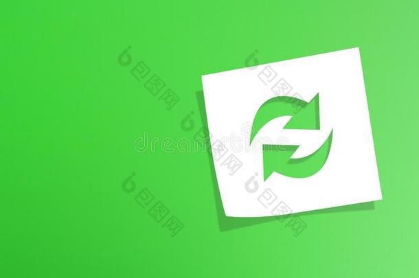 笔记纸和回收利用象征向绿色的背景