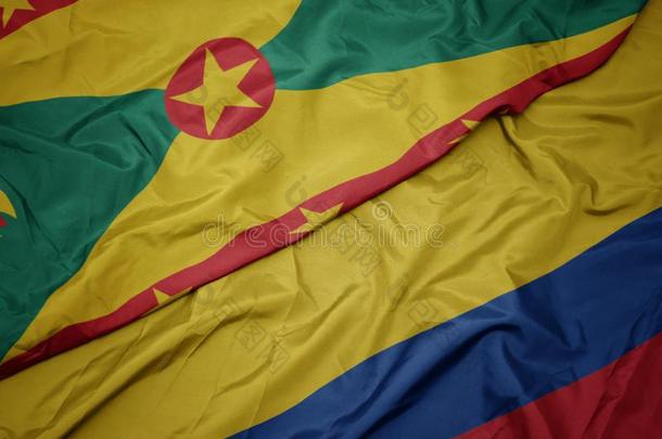 波浪状的富有色彩的旗关于哥伦比亚和国家的旗关于格林纳达