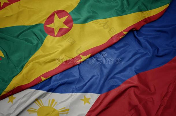 波浪状的富有色彩的旗关于菲律宾和国家的旗关于格林纳达