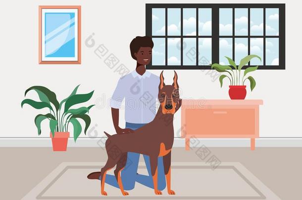 年幼的非洲式发型男人和漂亮的狗吉祥物采用指已提到的人房屋房间