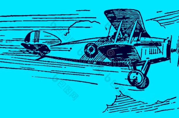 历史的<strong>双翼飞机</strong>飞行的在高的速度向一蓝色b一ckground