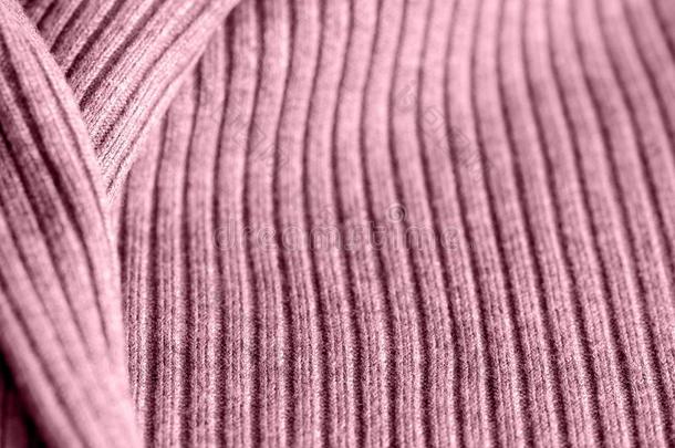 粉红色的针织品质地关-在上面.纺织品背景