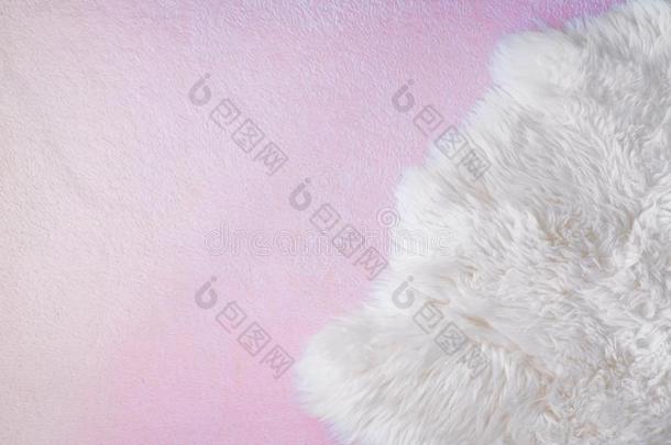 背景和白色的和粉红色的羊皮,羊毛质地.
