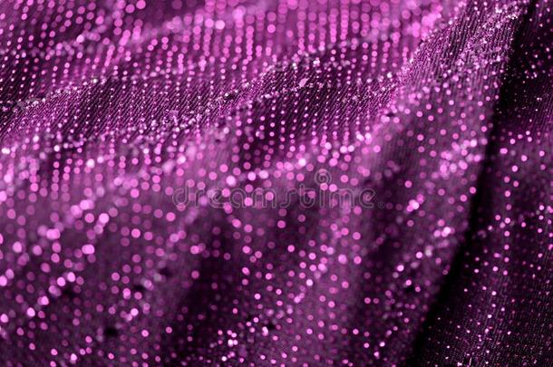 紫色的颜色纺织品和发火花关-在上面.织物背景