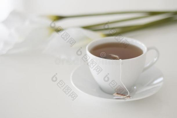 它`英文字母表的第19个字母茶水时间!Engli英文字母表的第19个字母h下午茶水,一白色的茶水cup一nd白色的一