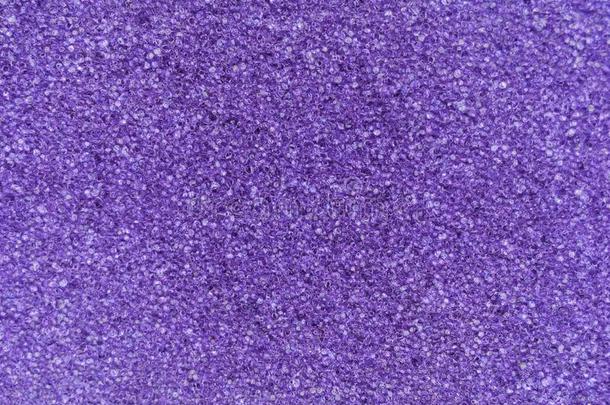 背景表面质地紫色的海绵起泡沫