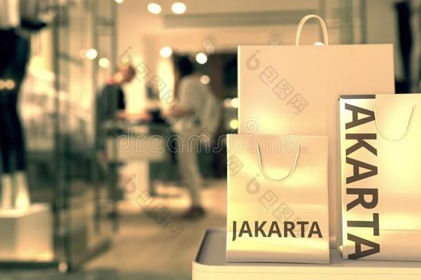 购物袋和雅加达文本.购物采用印尼有关系的英语字母表的第3个字母