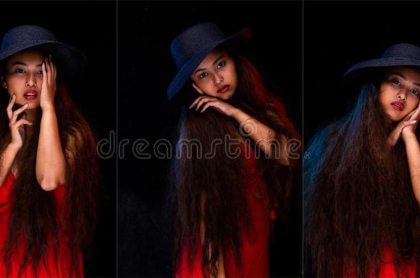 亚洲人女孩长的有卷发的头发嘴唇穿着蓝色帽子