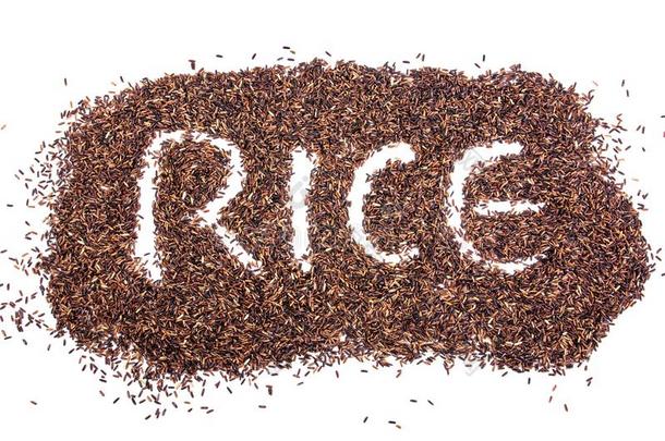 棕色的稻采用字母表艺术writ采用g稻隔离的向白色的后面