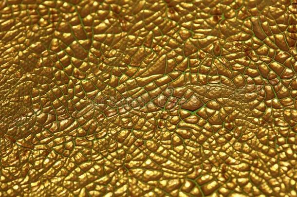 有裂缝的金色的颜料向帆布宏指令背景高的质量反馈抑制因子