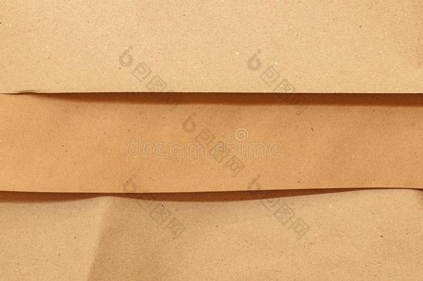 <strong>牛皮纸</strong>纸.棕色的背景为设计.波状的米黄色纸.赖恩