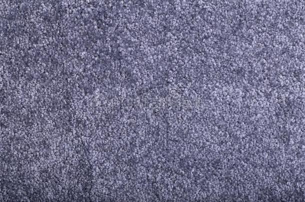 地毯掩蔽物背景.模式和质地关于紫罗兰地毯