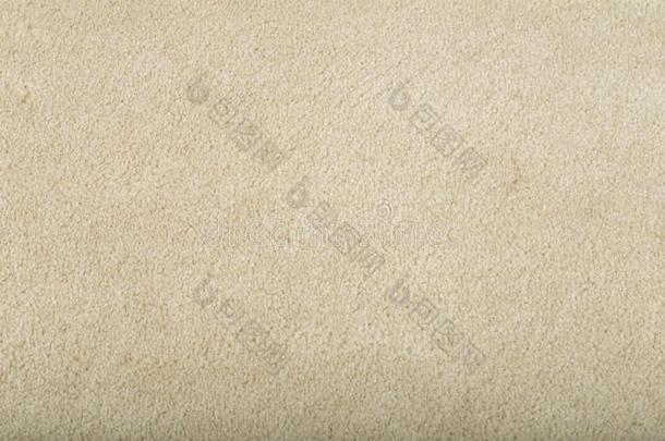 地毯掩蔽物背景.模式和质地关于米黄色地毯.