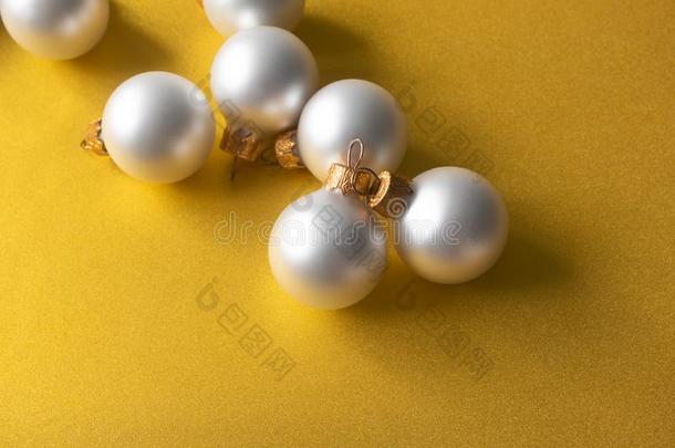 圣诞节表面暗淡的珍珠颜色杂乱向发光的金色的背景和