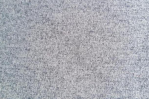 织地粗糙的关于灰色或灰色的羊毛地毯或小块地毯f或背景或warmair热空气