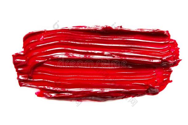 涂抹和质地关于红色的口红或油颜料隔离的向白色的