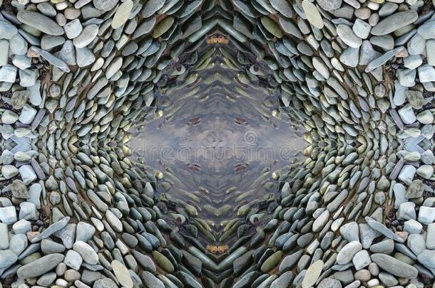 光滑的圆形的卵石石头抽象的艺术背景